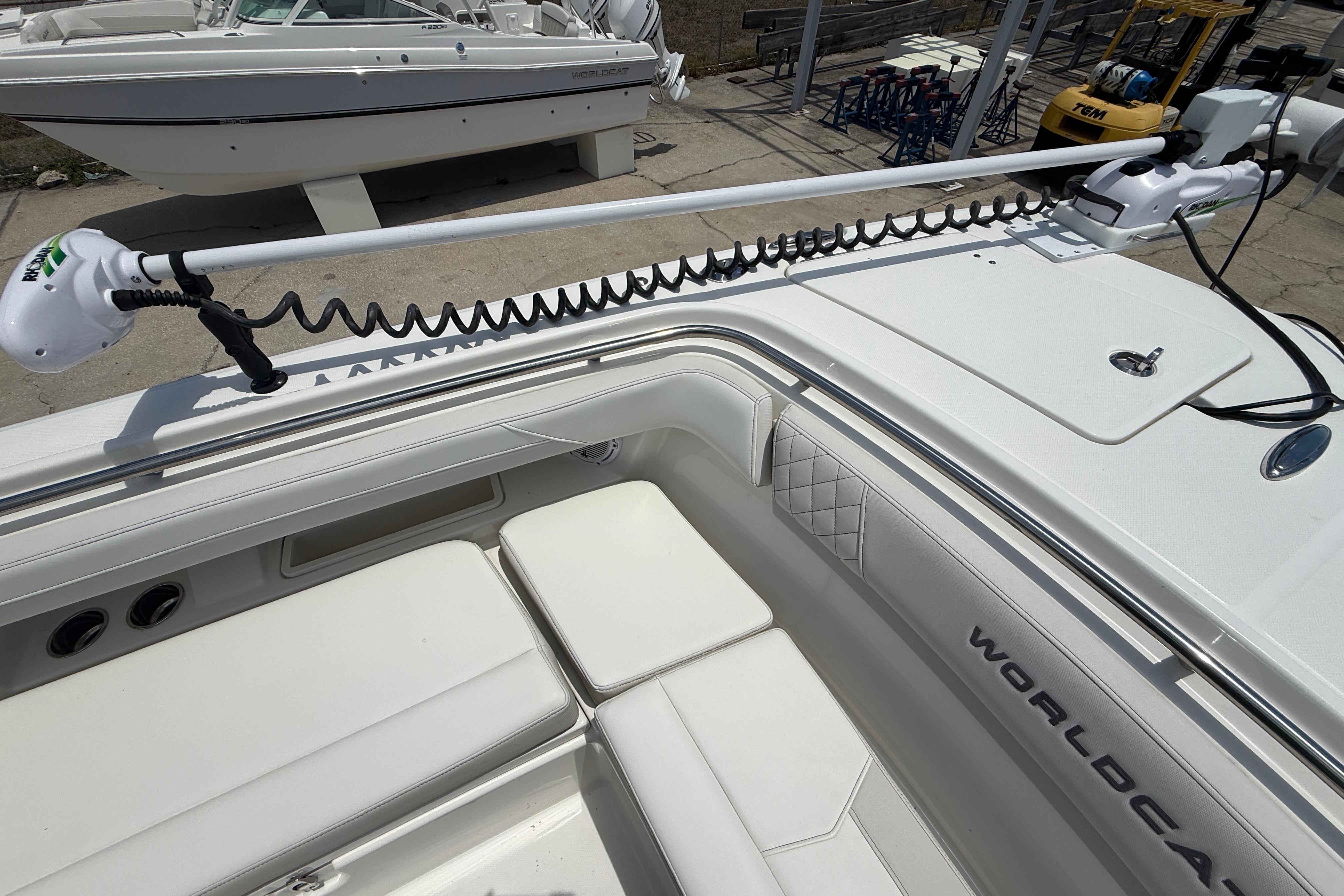 2024 World Cat 280 CC-X boat interior with seating and trolling motor.