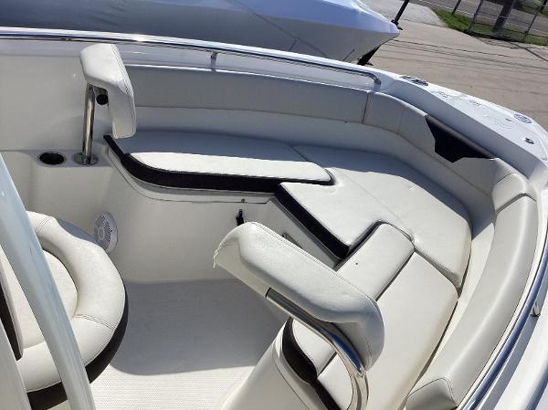 2022 Sailfish 220 CC boat interior with white cushioned seating.