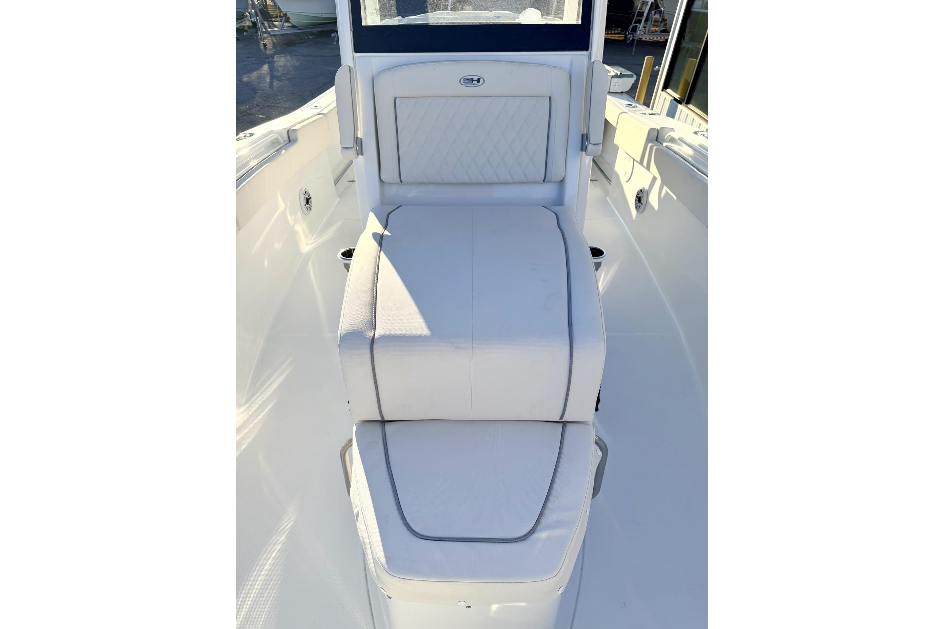 2026 Sea Hunt Ultra 275 Coffin Box boat interior with cushioned seating.