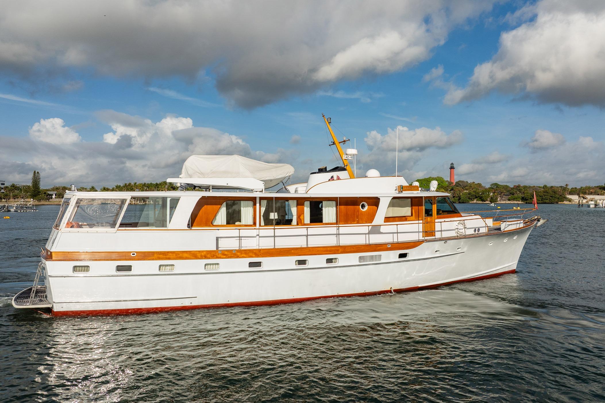 Classic 1972 Trumpy 72 Motor Yacht cruising on a sunny day.