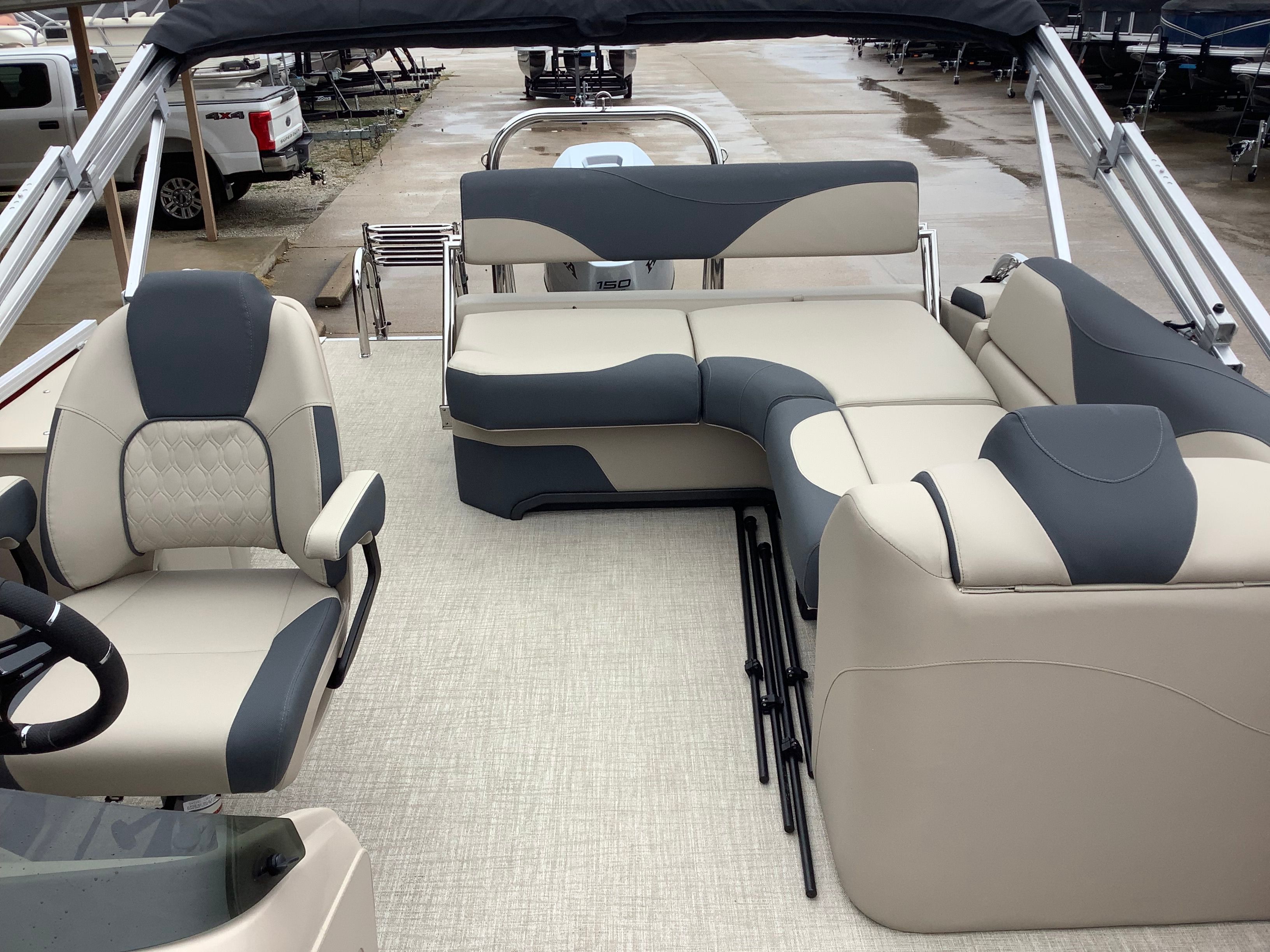 Interior of 2026 Tahoe 2185 LTZ pontoon boat with luxurious seating.