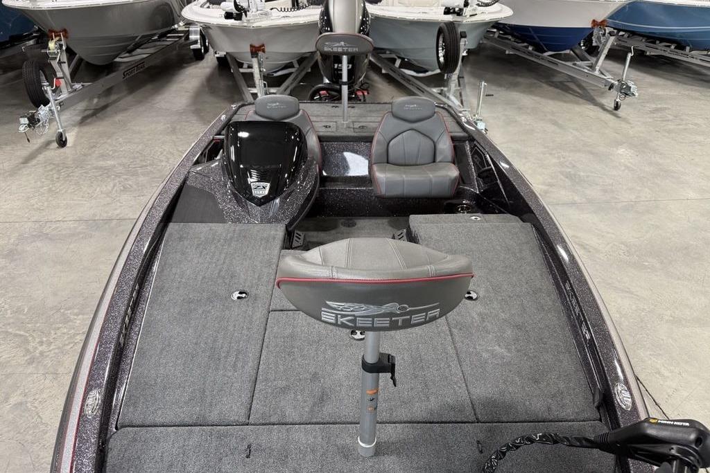 2025 Skeeter ZX150 bass boat interior with seating and control panel.