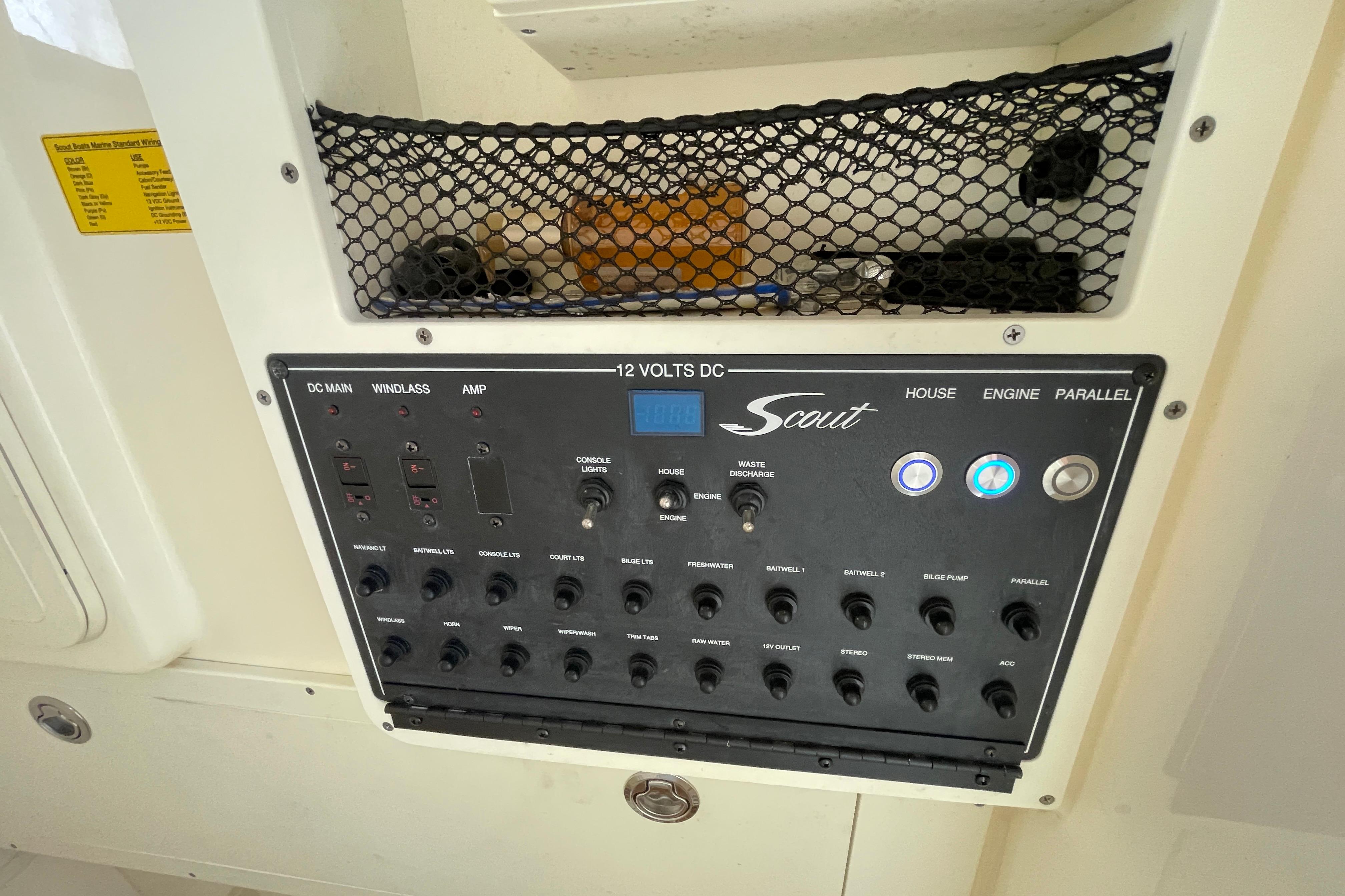 Control panel of a 2020 Scout 255 LXF boat with various switches and indicators.