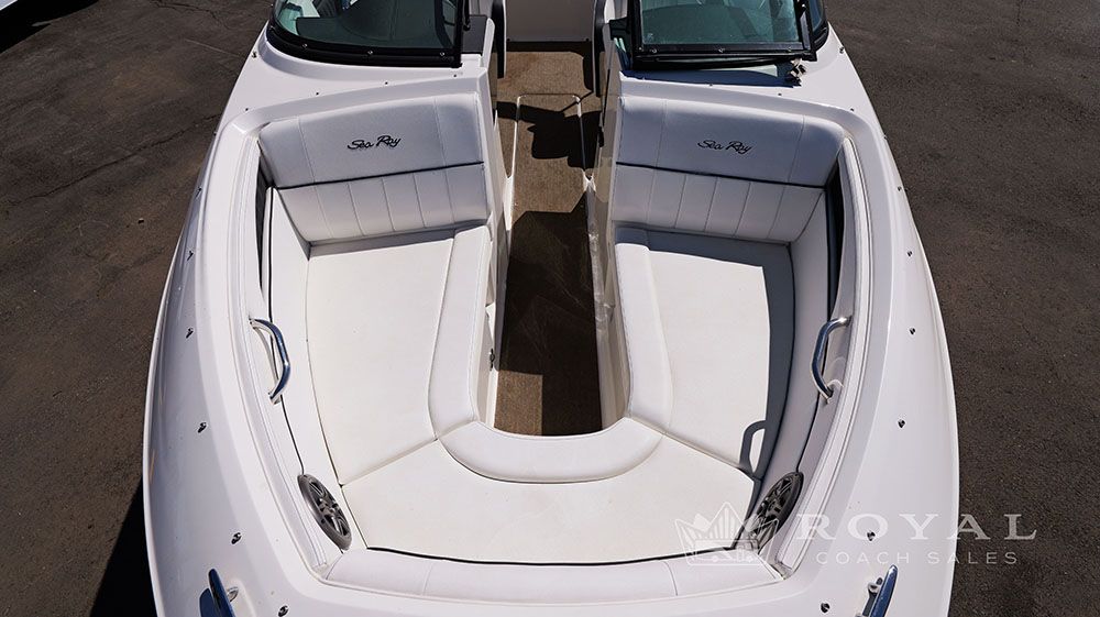2014 Sea Ray SLX 230 with spacious, cushioned bow area and sleek white seating.