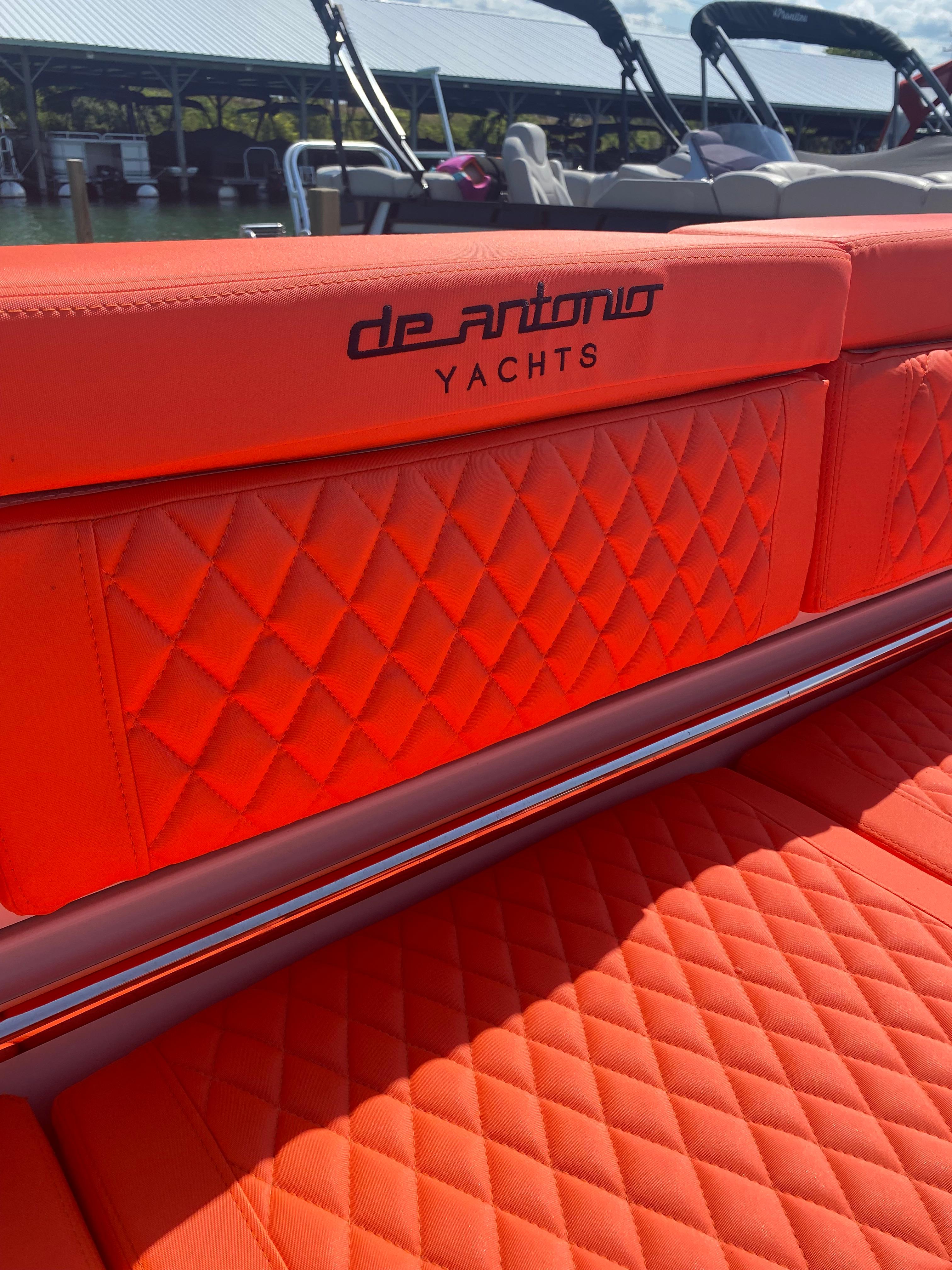 De Antonio Yachts D 28 2020 model with luxurious orange quilted seating.