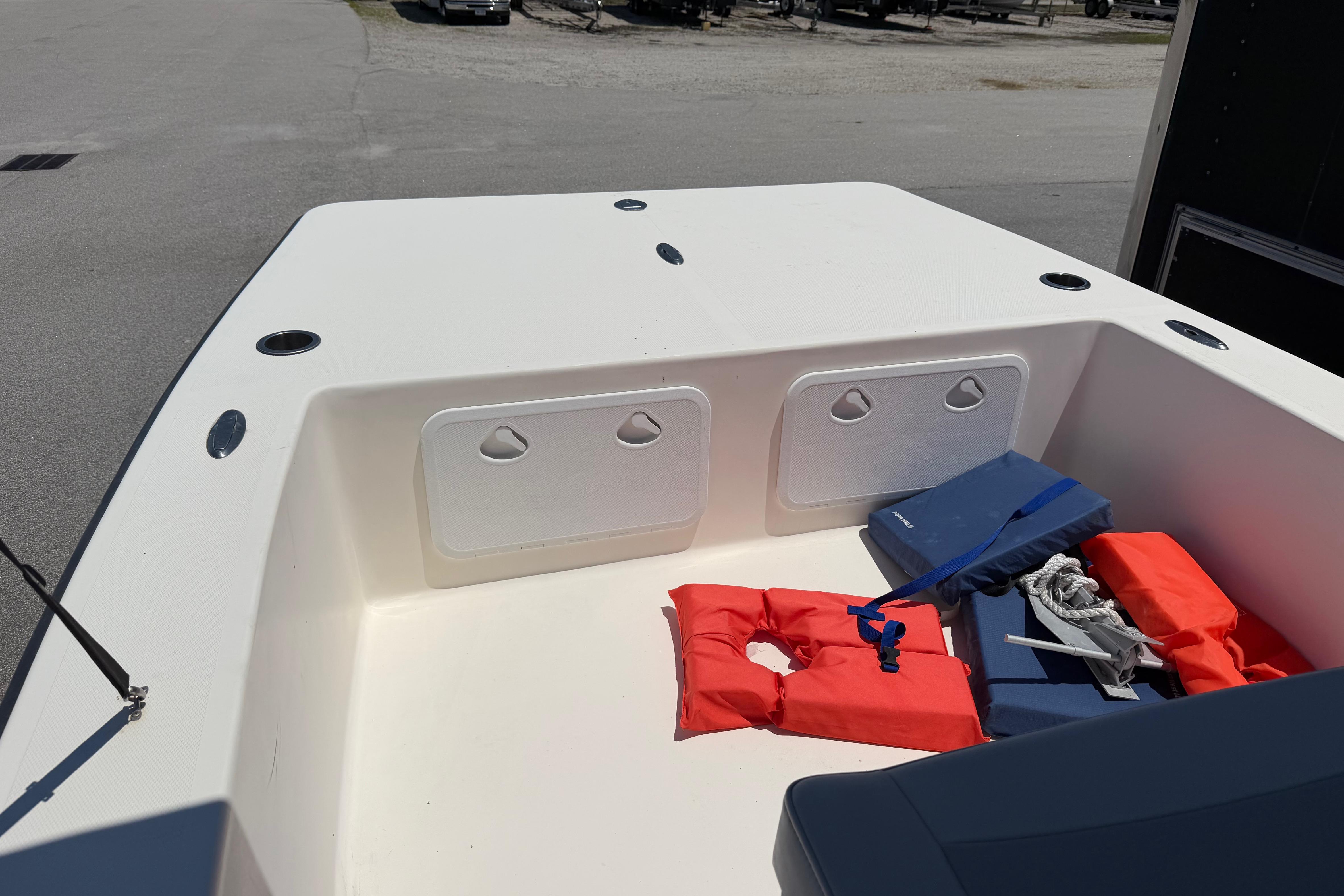 2008 KenCraft Bay Rider 2060 boat deck with life jackets and cushions.