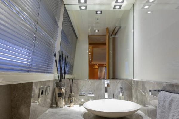 Luxurious bathroom in 2009 Maiora 31DP yacht with modern fixtures and elegant design.
