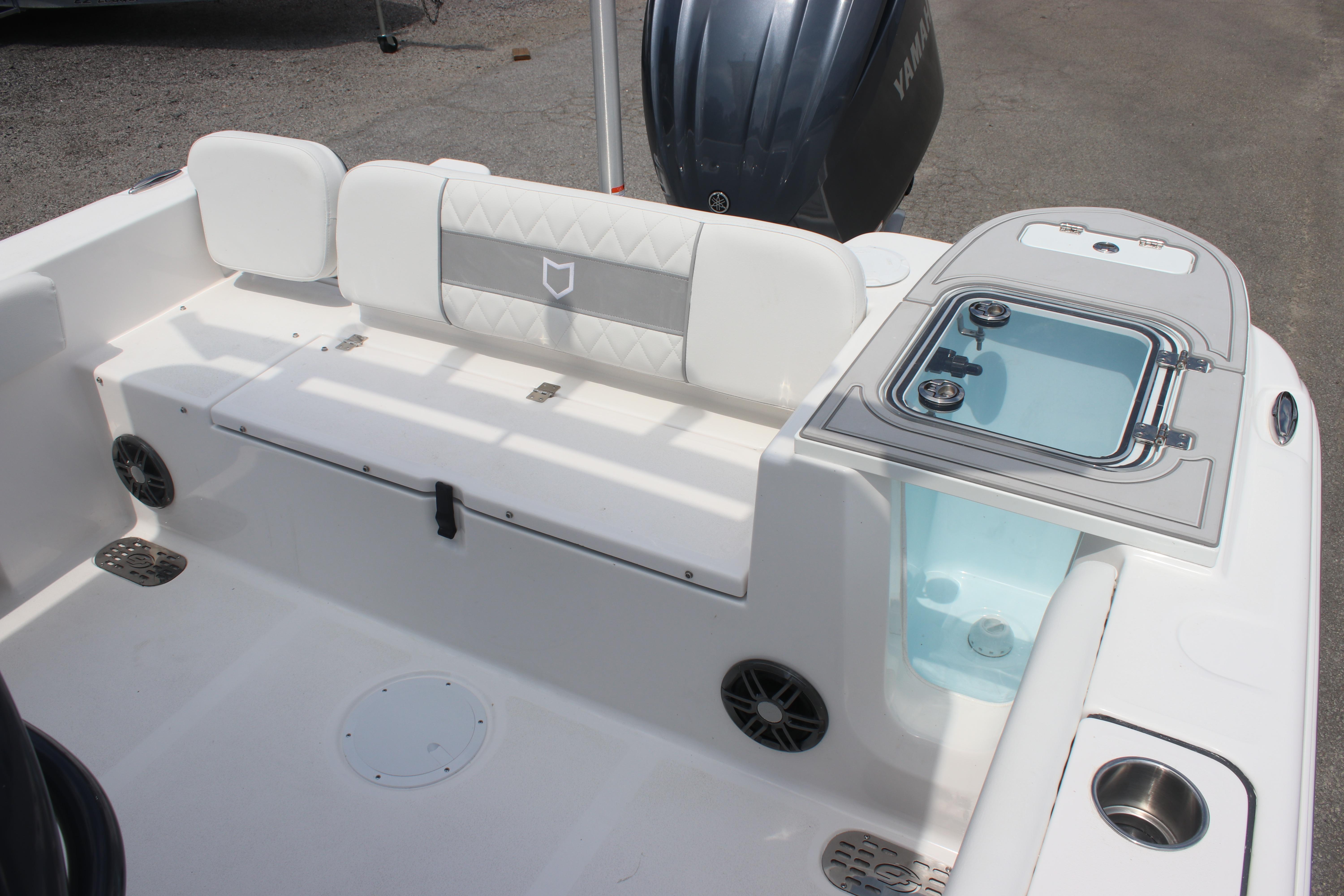 2026 Sea Fox 248 Commander boat interior with seating and livewell.