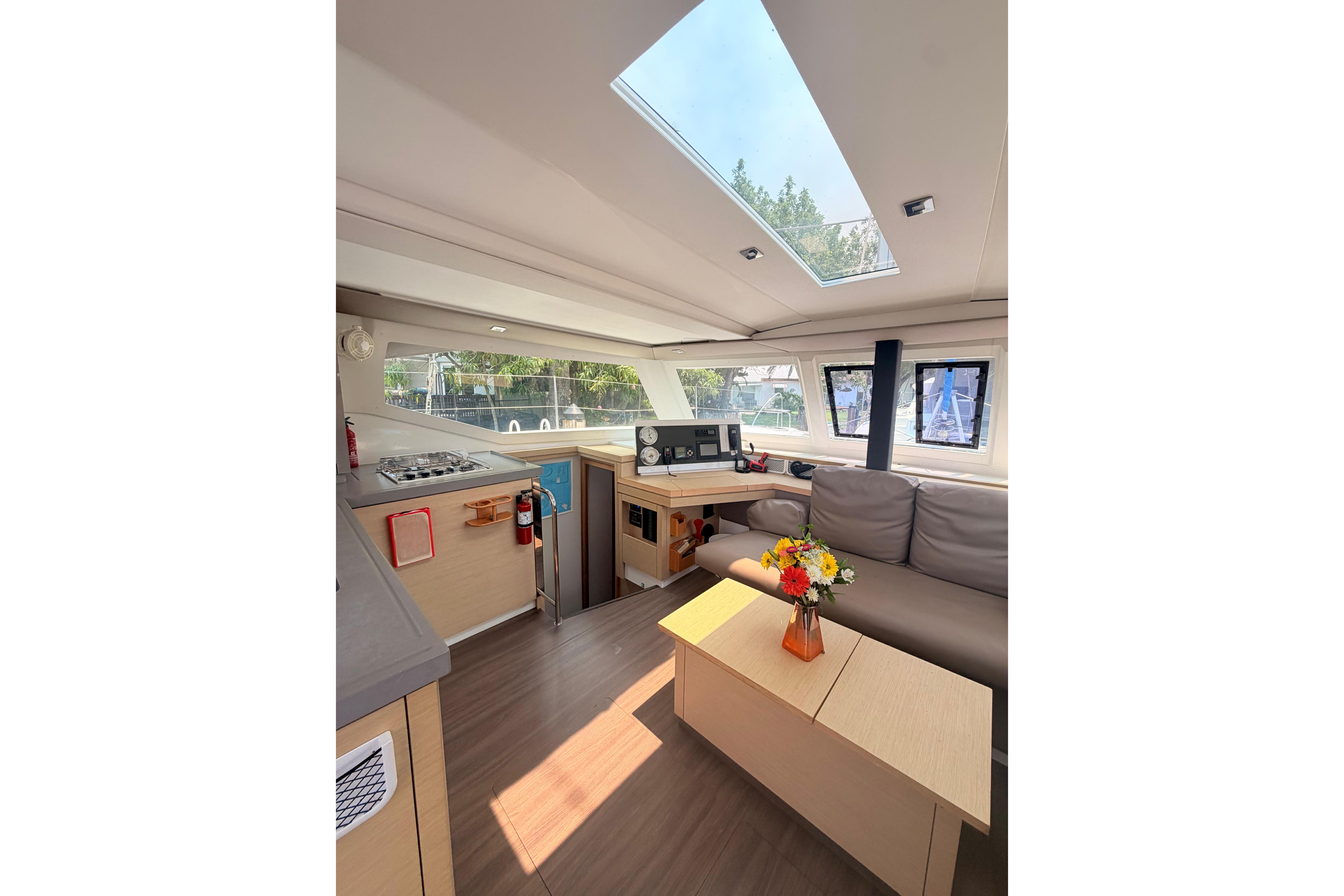 Interior of 2018 Fountaine Pajot Lucia 40 catamaran with modern design and skylight.