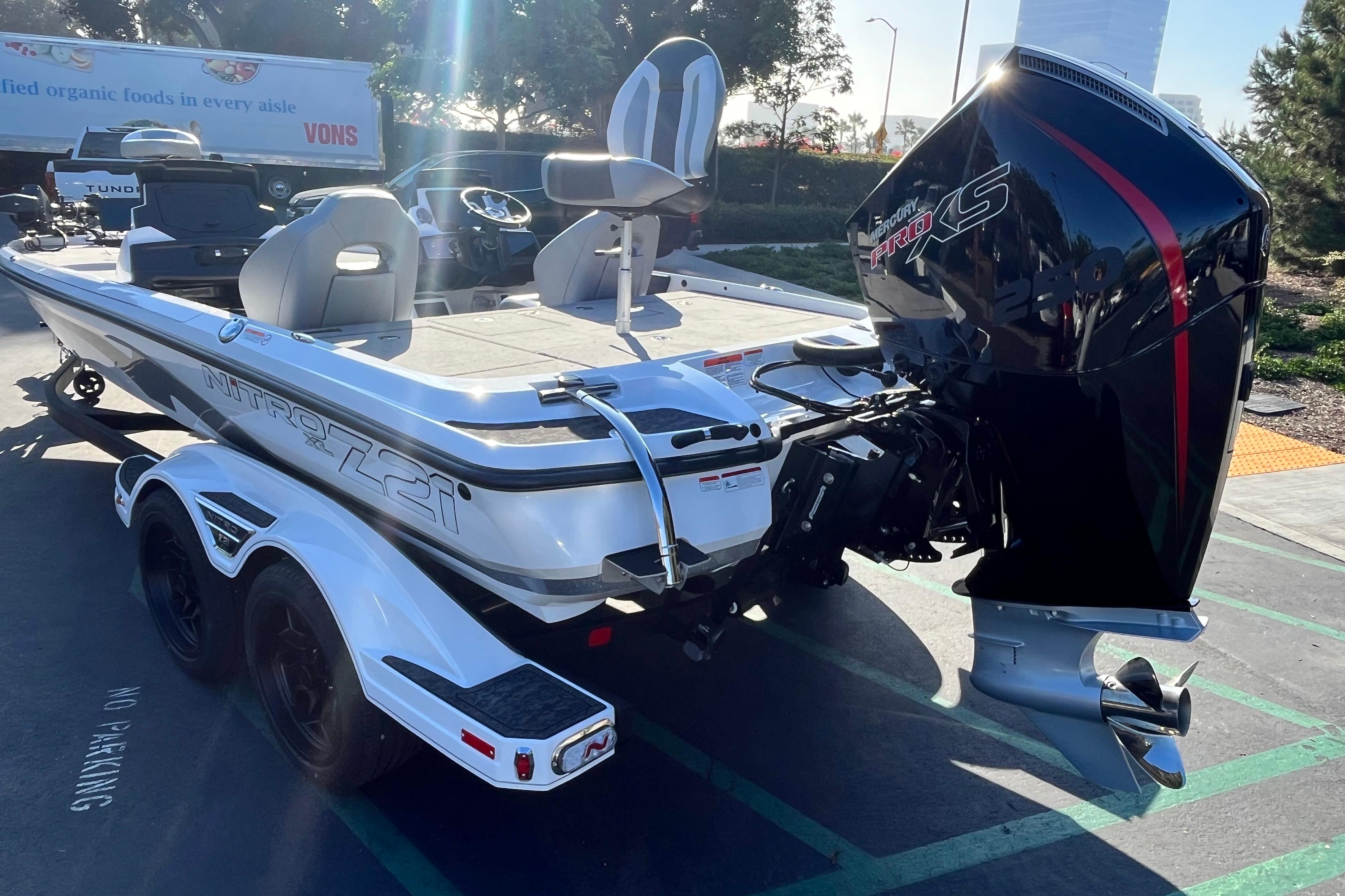 2026 Nitro Z21 XL Pro boat with powerful engine, parked outdoors in sunlight.