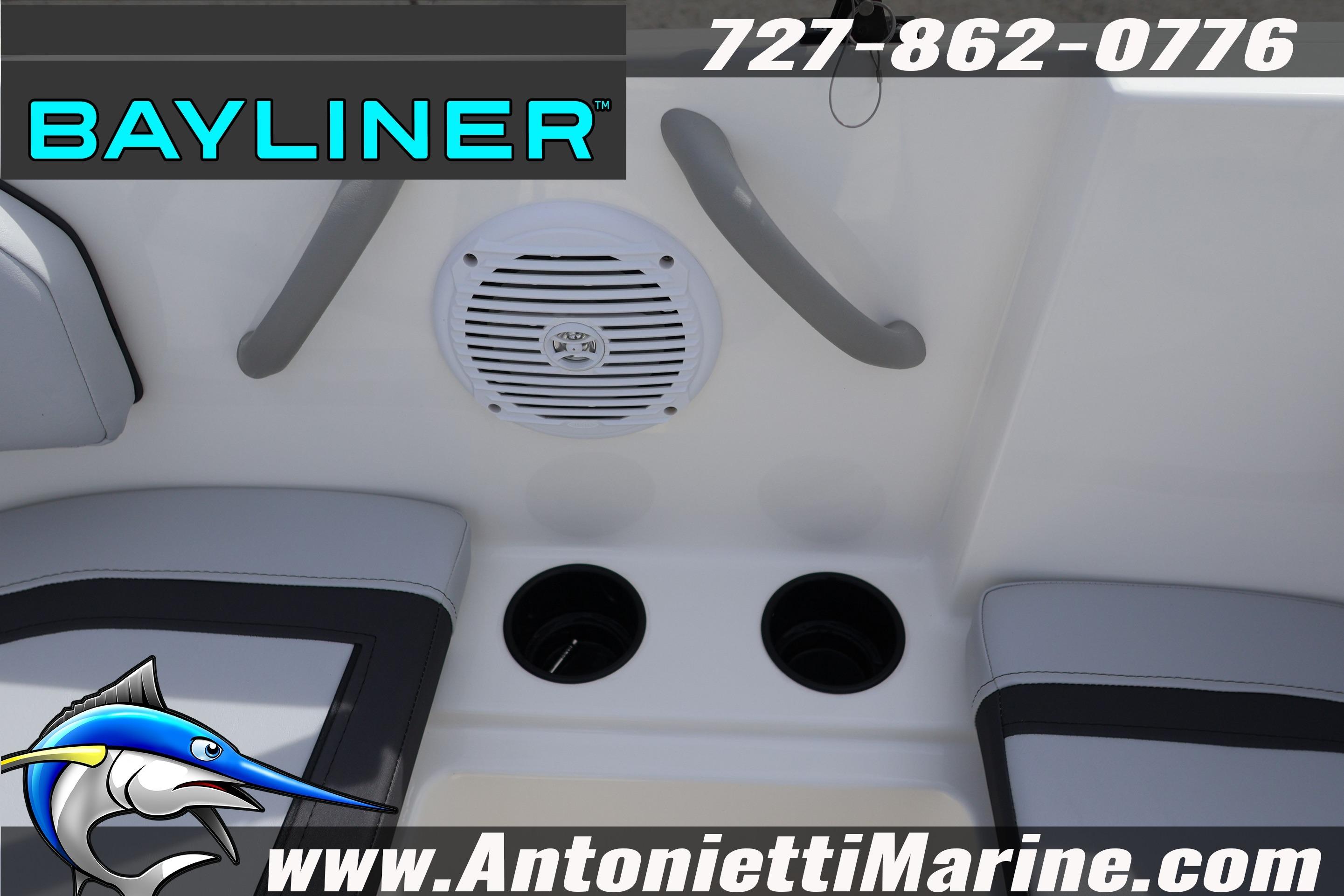 2026 Bayliner Element M17 boat interior with speaker and cup holders.