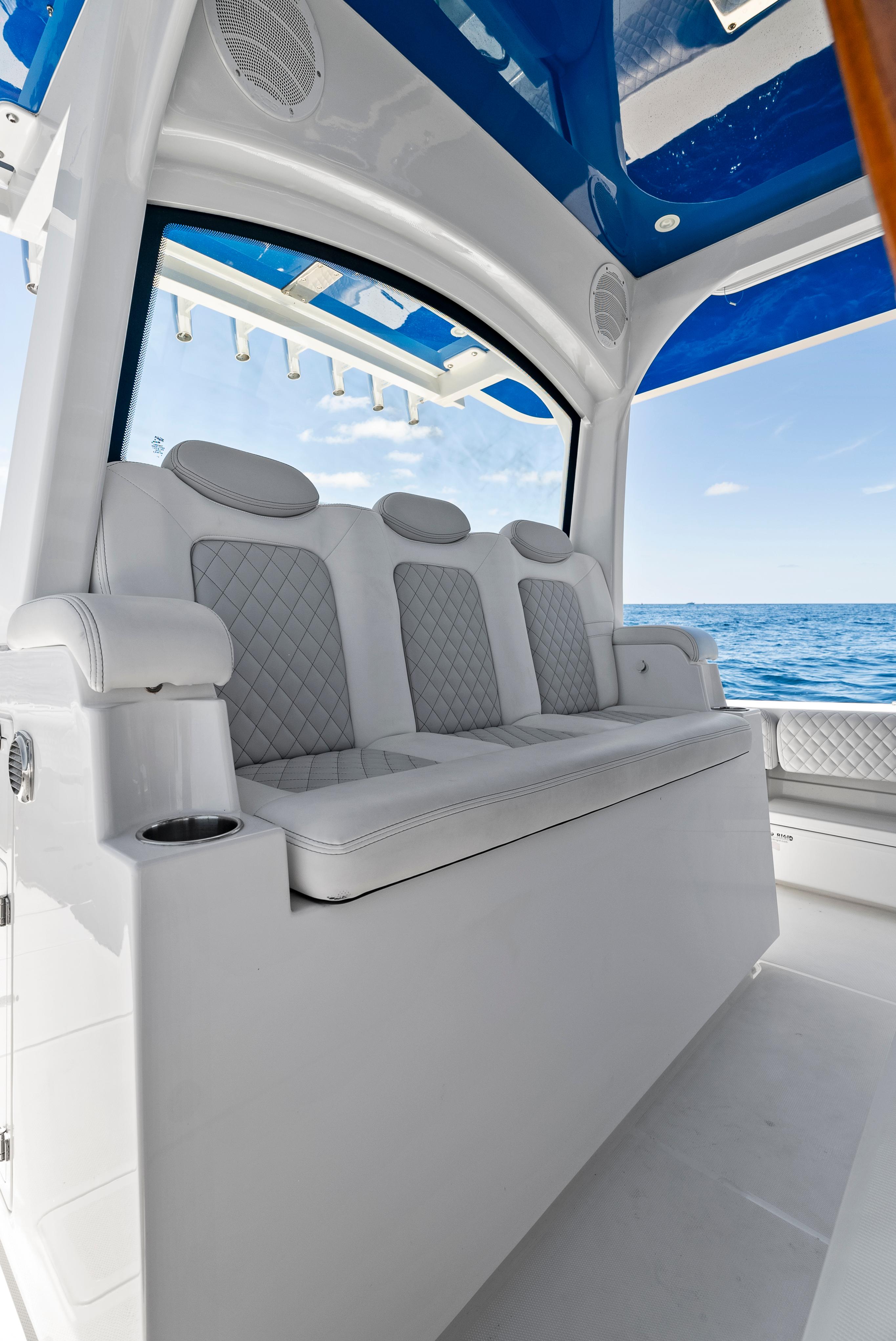 2022 HCB Suenos boat interior with luxurious seating and ocean view.