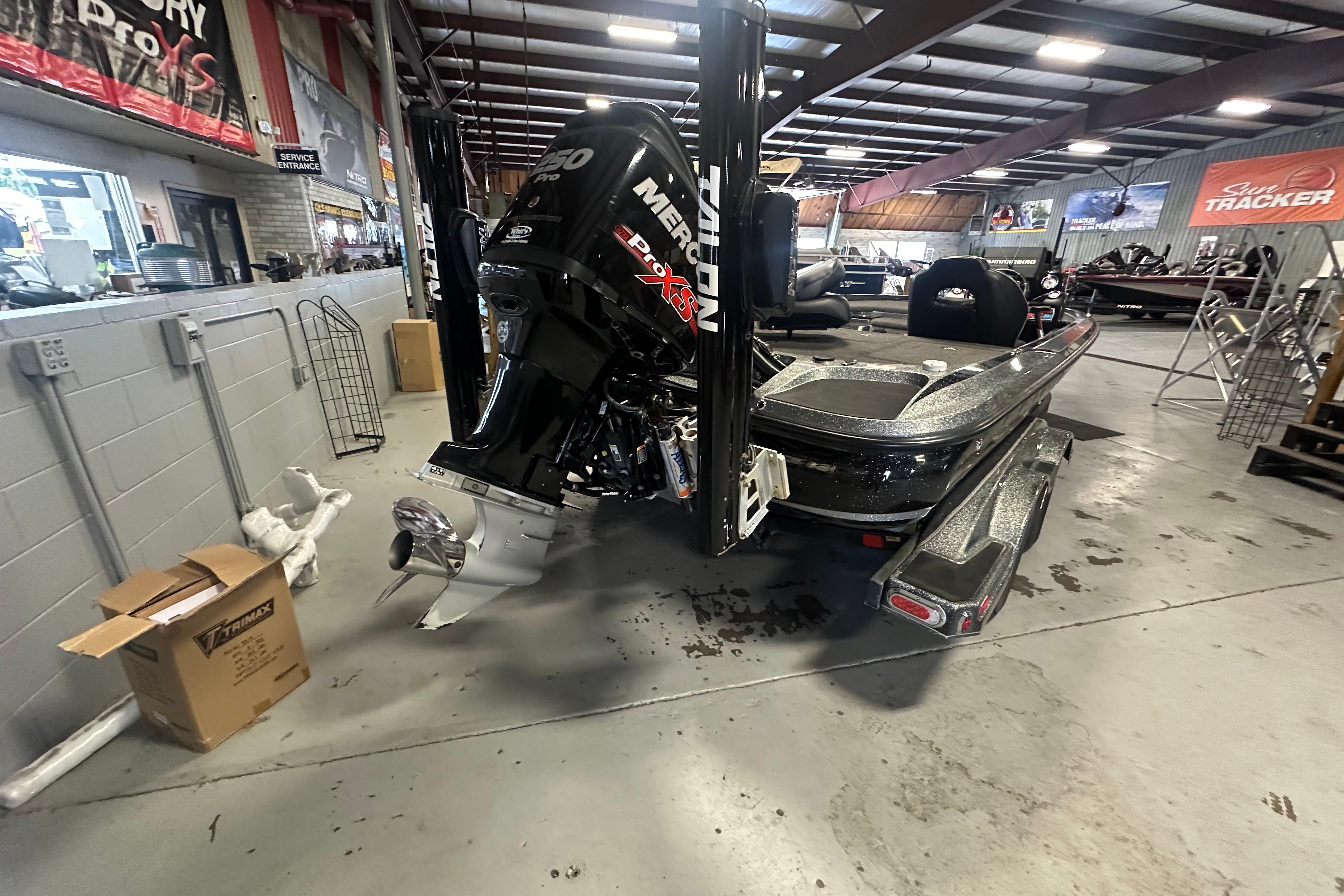 Nitro Z20 Pro 2018 boat in showroom, featuring powerful Mercury engine.