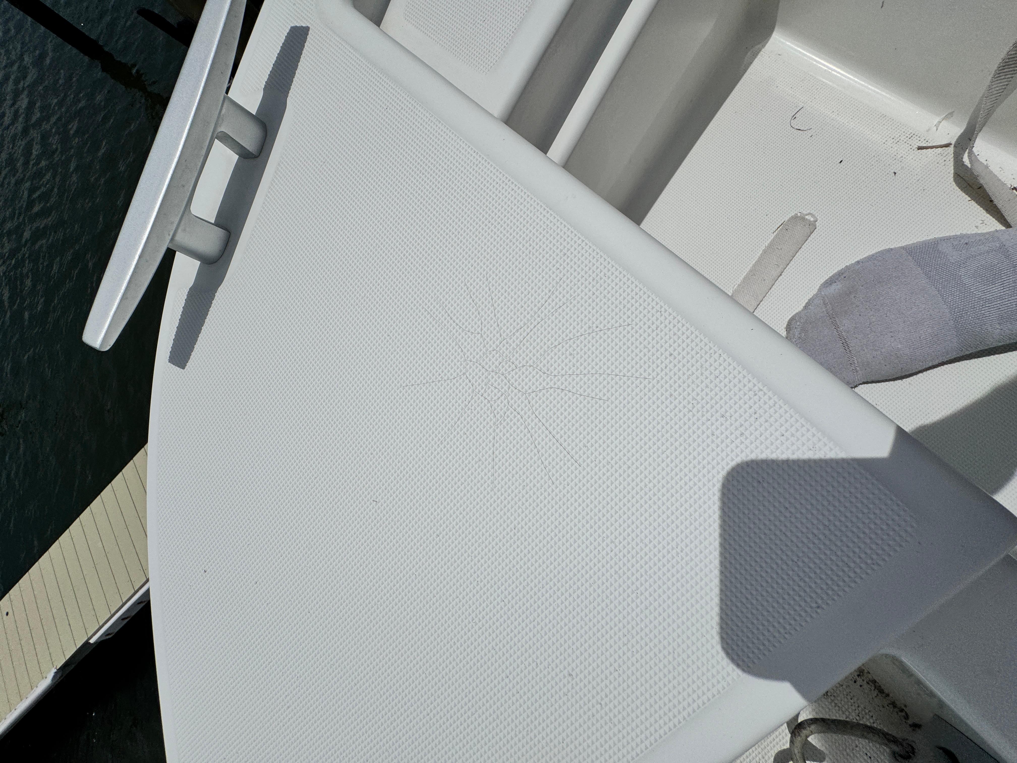 2022 Beneteau Flyer 9 SUNdeck boat deck with cleat and textured surface.