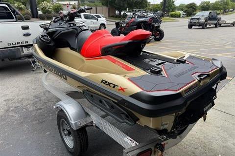 2025 Sea-Doo RXT-X 325 jet ski on trailer, parked in a lot.
