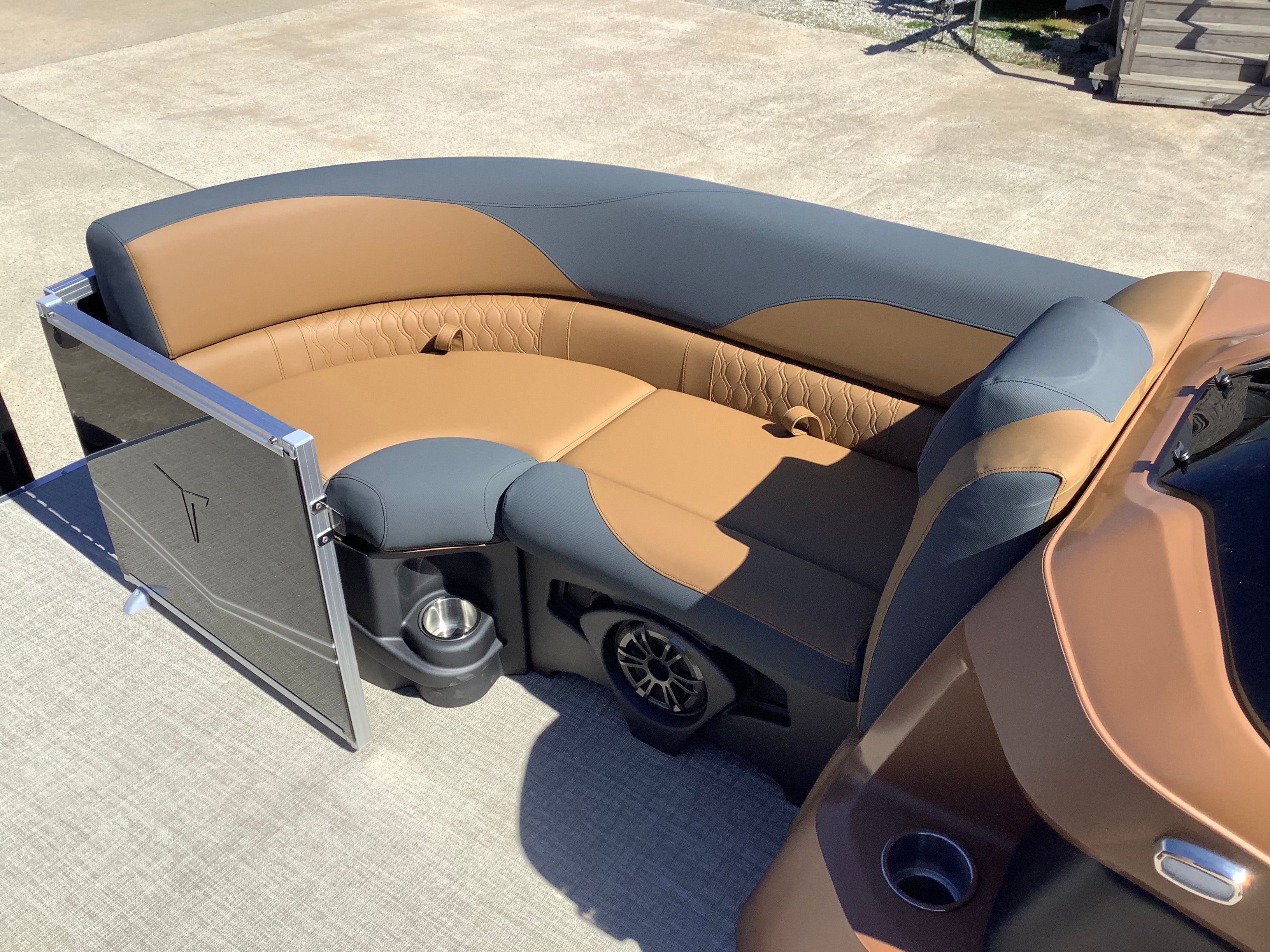 Luxurious seating in the 2026 Tahoe 2385 LTZ Quad Lounger Shift boat.