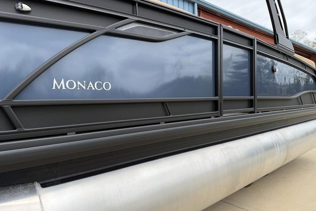 2026 Godfrey Monaco 235 SFLC iMPACT pontoon boat, sleek design, side view.