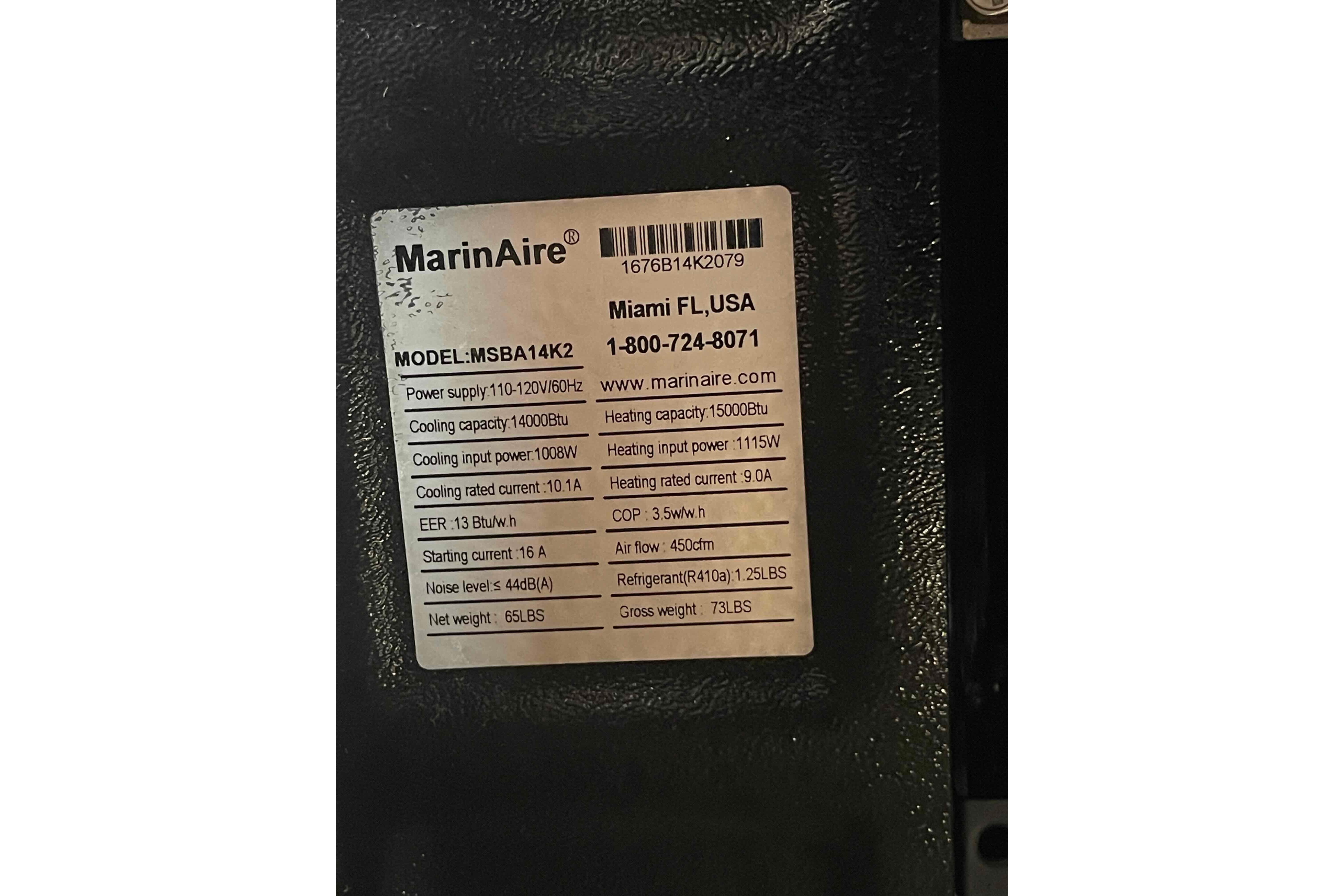 Label on MarinAire MSBA14K2 air conditioning unit, specifications and contact details.