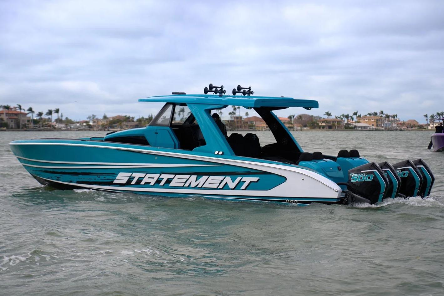 Manufacturer Provided Image: 2025 Statement 430 Tigress boat cruising on water with multiple engines.