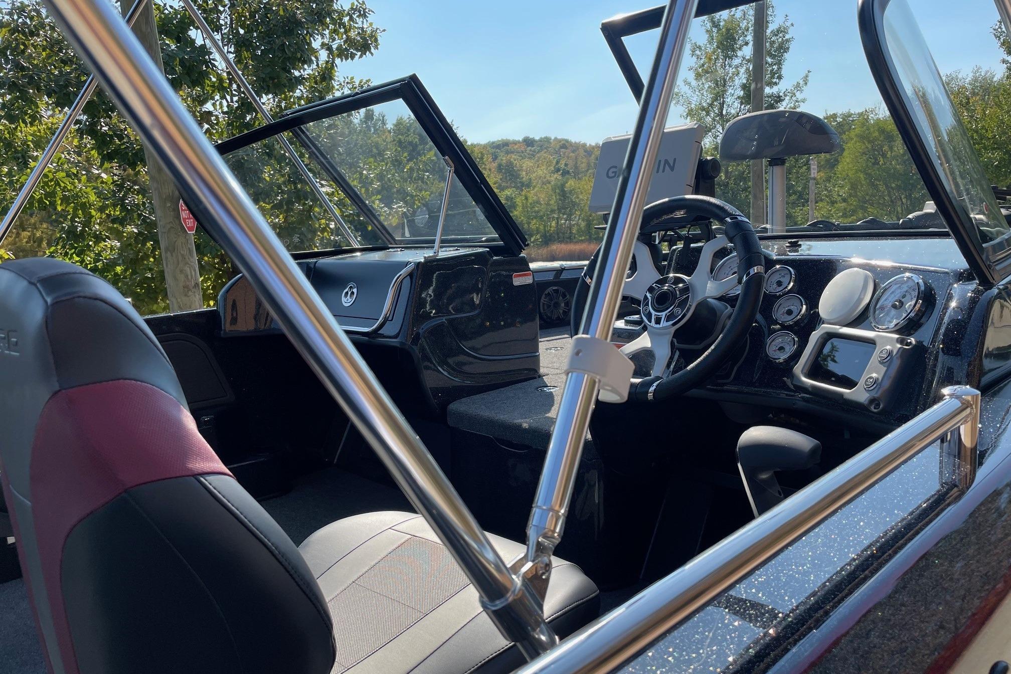 Interior of 2026 Nitro ZV19 Sport Pro boat with modern dashboard and steering wheel.