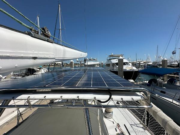 Concordia 52 sailboat with solar panels docked at marina, 1989 model.