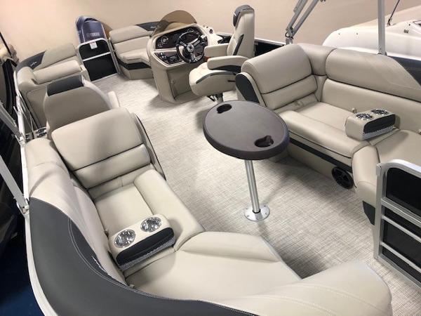 2023 South Bay 224RS LE 2.75 pontoon boat interior with luxurious seating and modern helm.