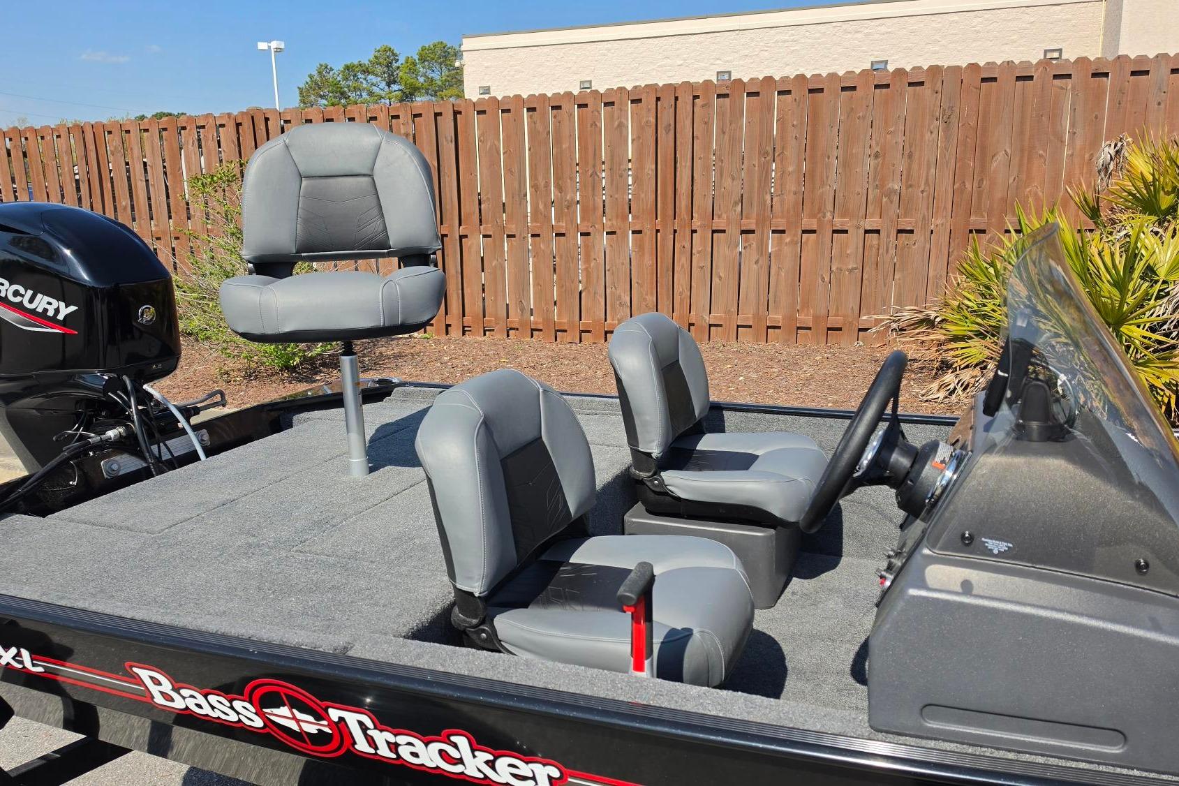 2026 Tracker Bass Tracker Classic XL boat interior with seating and steering wheel.