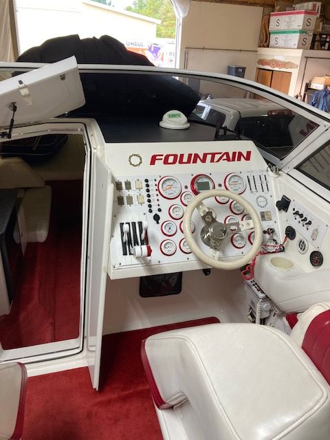 Interior of a 2001 Fountain Lightning boat with steering console.