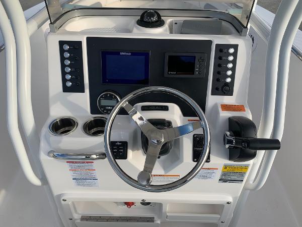 2024 Robalo R202 Explorer boat console with steering wheel and navigation controls.