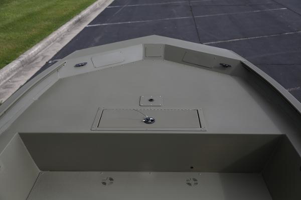 2025 Tracker GRIZZLY 1860 Utility boat deck, featuring storage compartments.