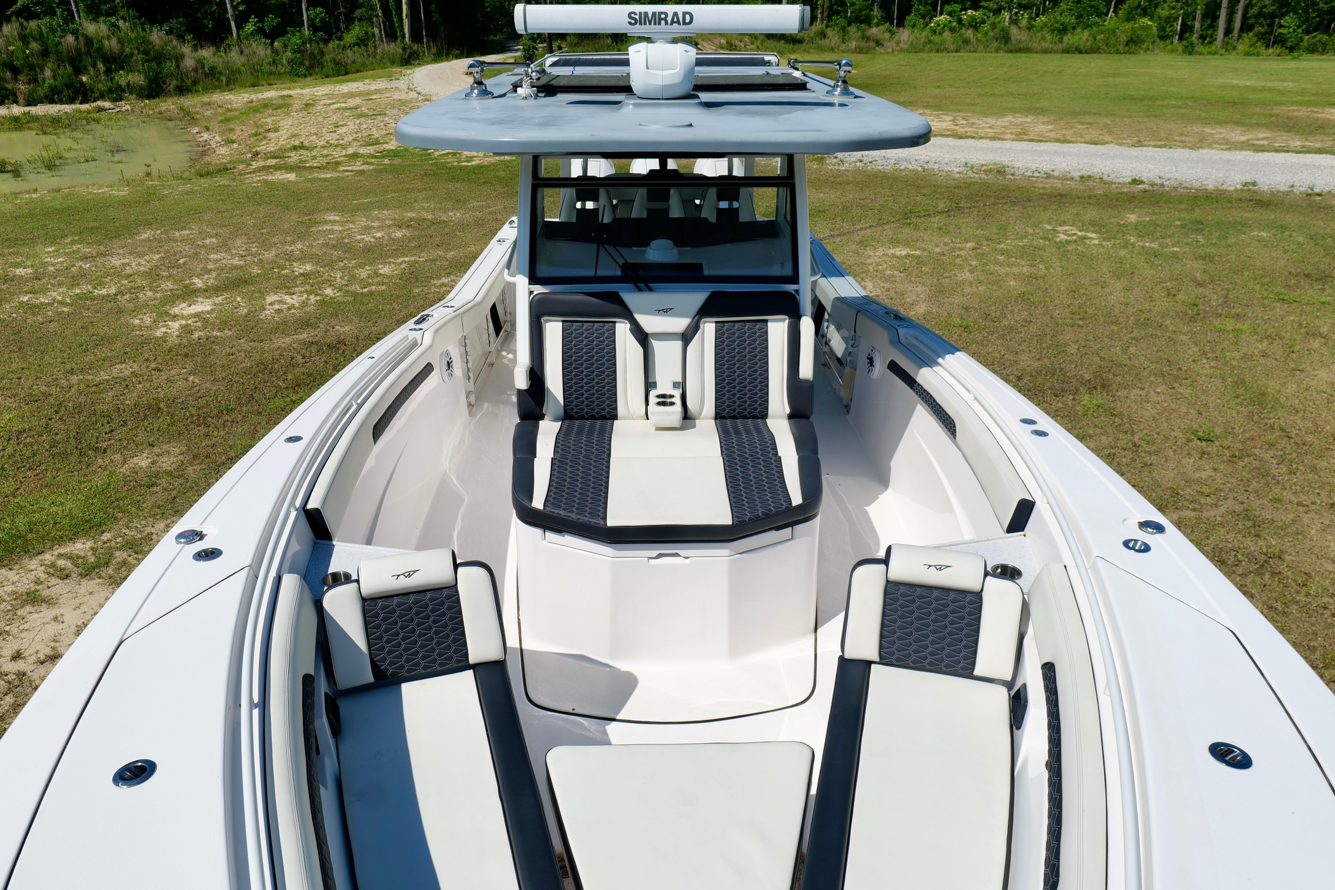 2024 Tidewater 380 CC Adventure boat with sleek seating and modern design.