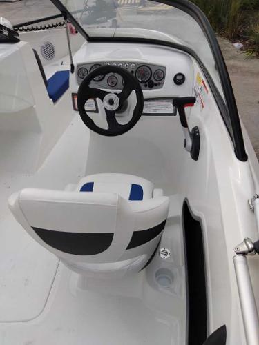 2024 Tahoe 185 S boat interior with steering wheel and dashboard.