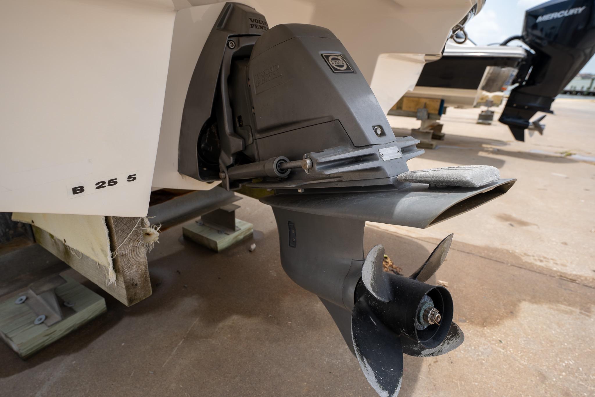Close-up of a 2008 Regal 2000 Bowrider boat's outboard motor on a trailer.