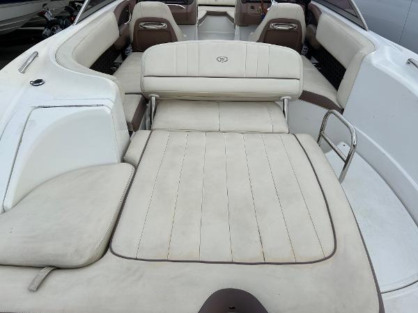 2010 Cobalt 262 boat interior with beige seating and spacious layout.