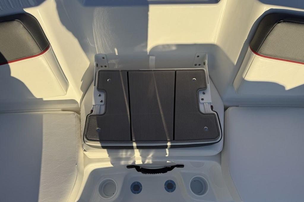 2026 Tahoe T16 boat interior seating with storage compartment.