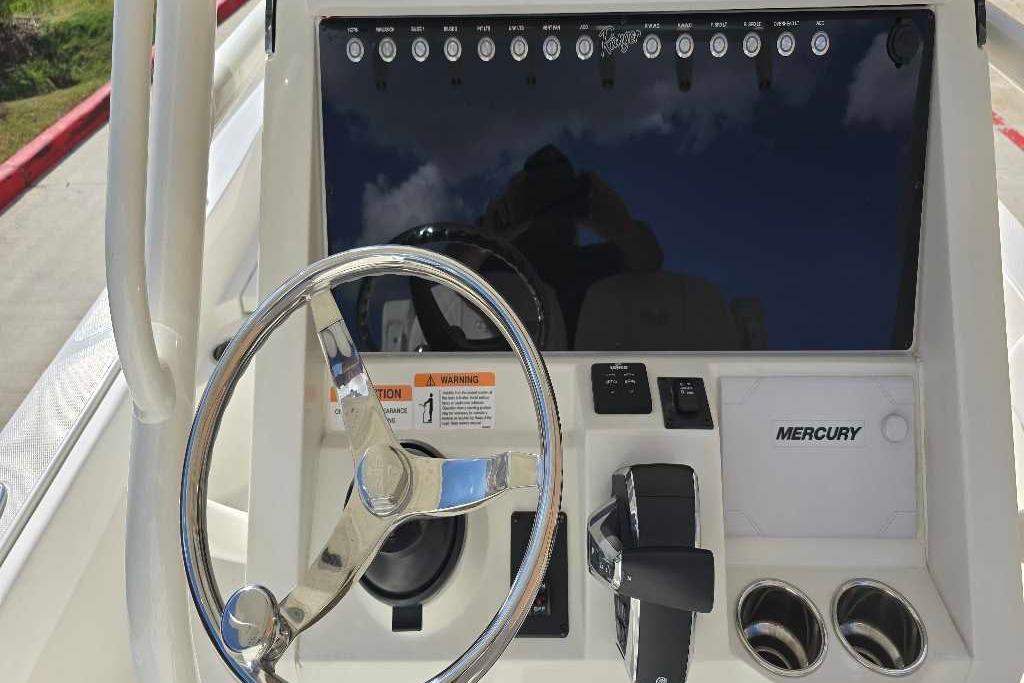 2025 Ranger 2360 Bay boat dashboard with steering wheel and Mercury controls.