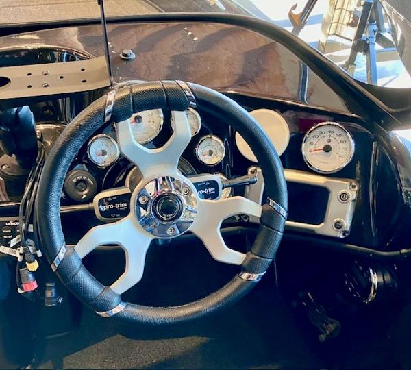 2024 Nitro ZV19 Pro dashboard with steering wheel and gauges.