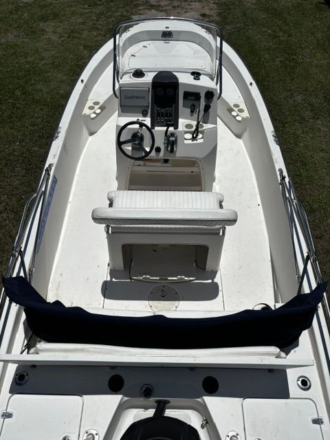 A 2008 Boston Whaler 200 Dauntless. The boat features a central console and seating area.