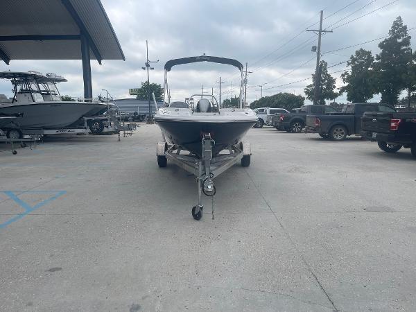 2022 Hurricane SS185 OB boat on a trailer in a parking lot.