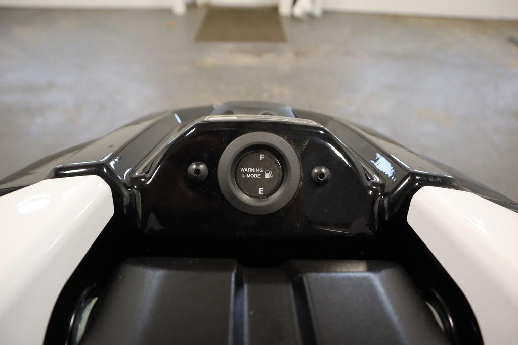 2025 Yamaha WaveRunner SuperJet dashboard with fuel gauge and warning indicator.