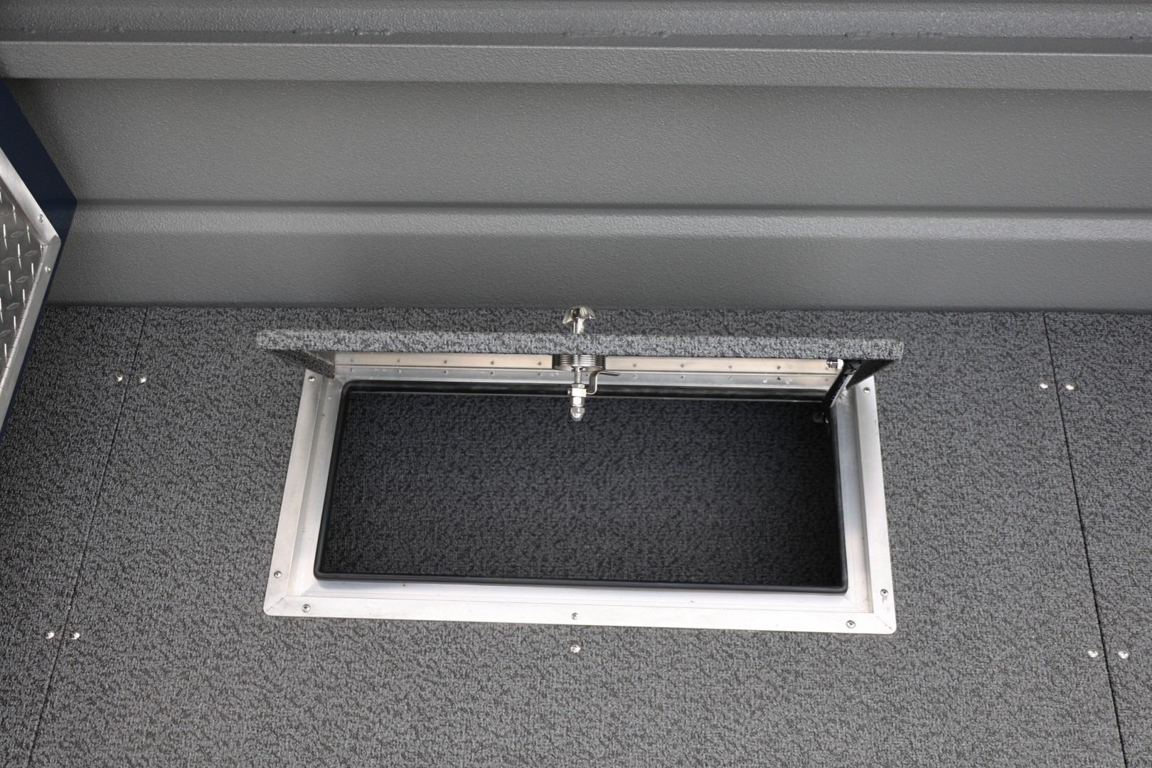 Open storage compartment on 2026 Thunder Jet 24 Alexis Pro boat deck.