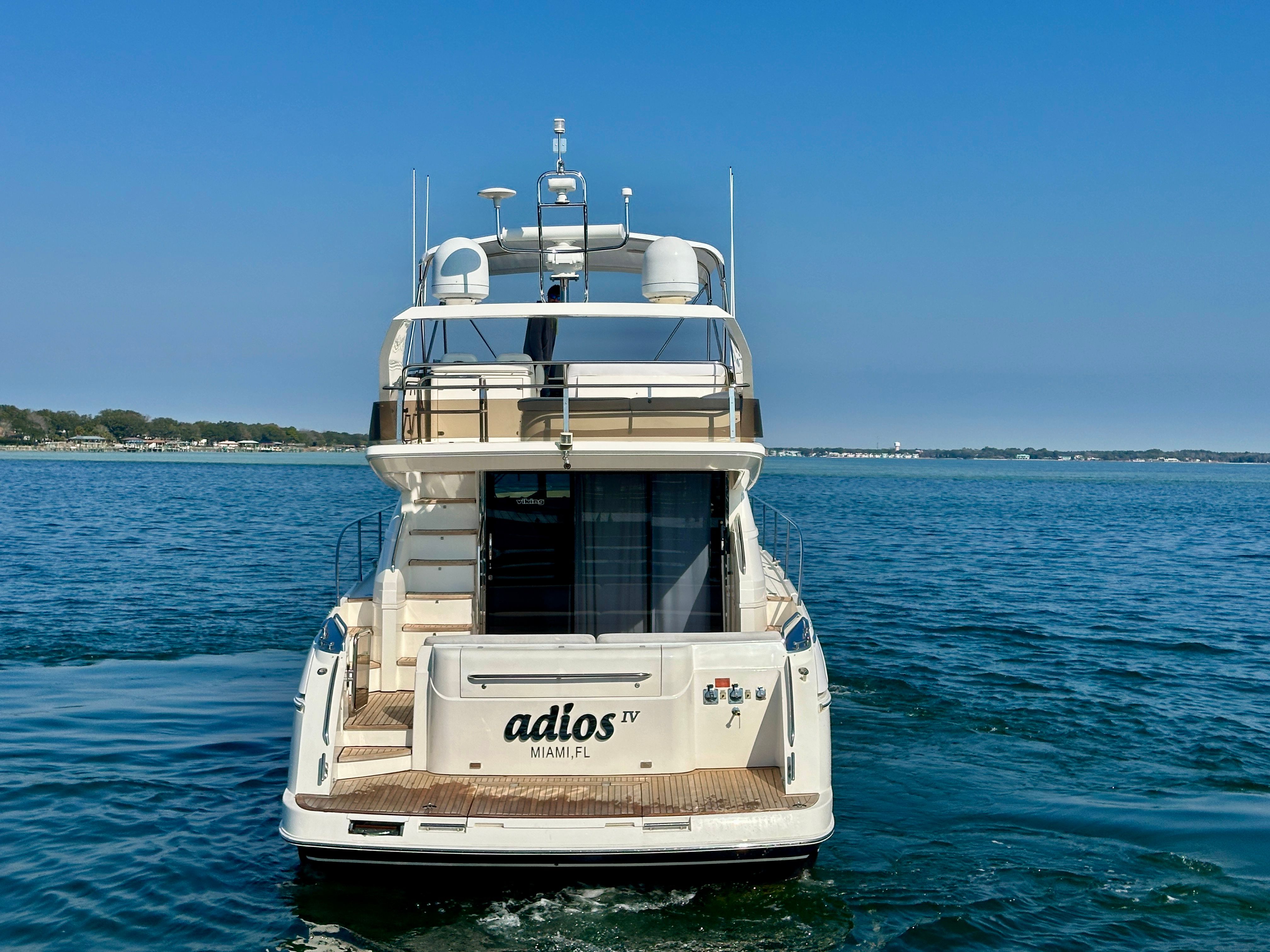 2009 Viking Princess F54 Flybridge yacht on open water.