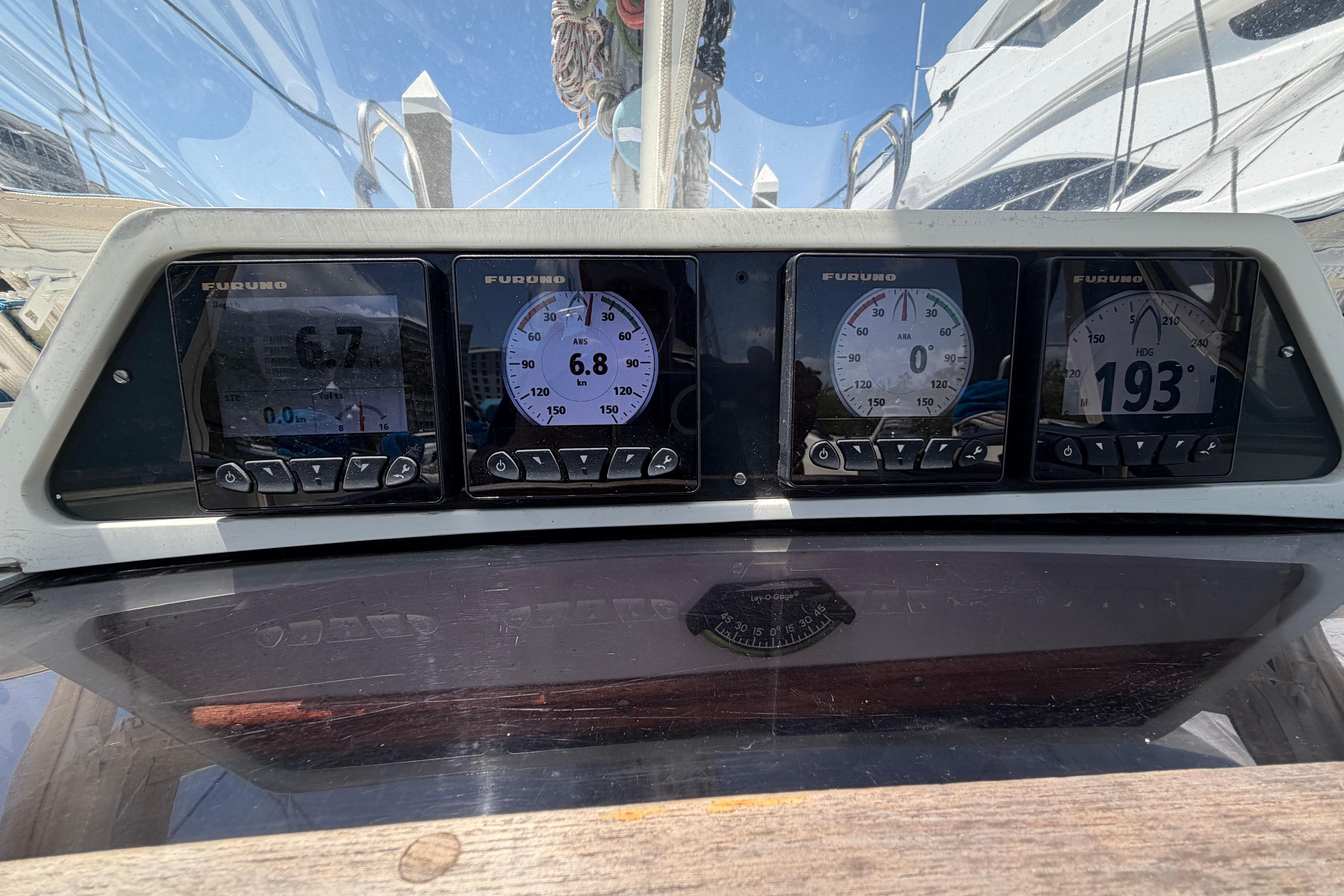 Sailing instruments on a 1987 Moody 376 yacht displaying speed and navigation data.