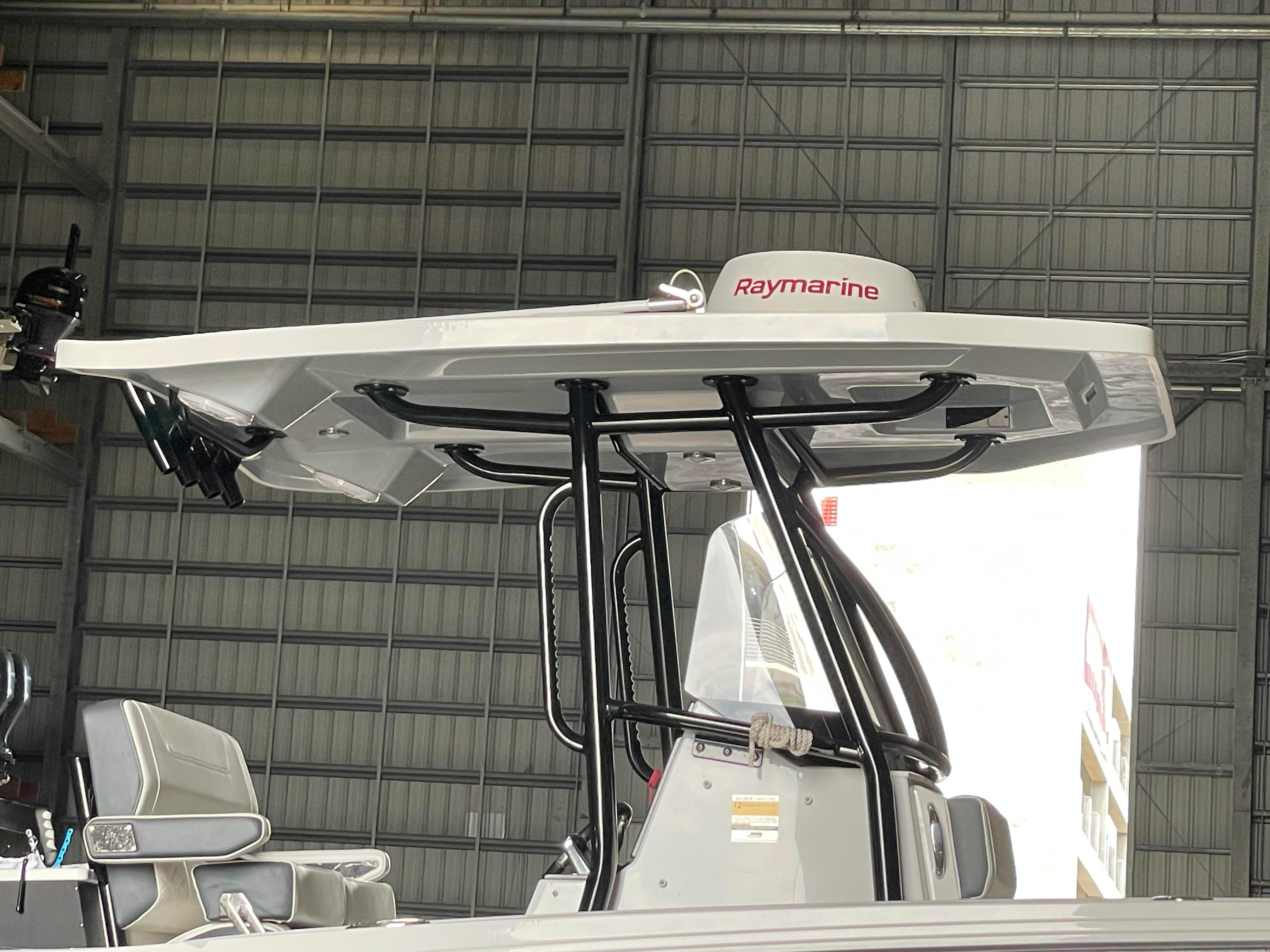 2023 Blackfin 252 CC boat with Raymarine equipment in a storage facility.