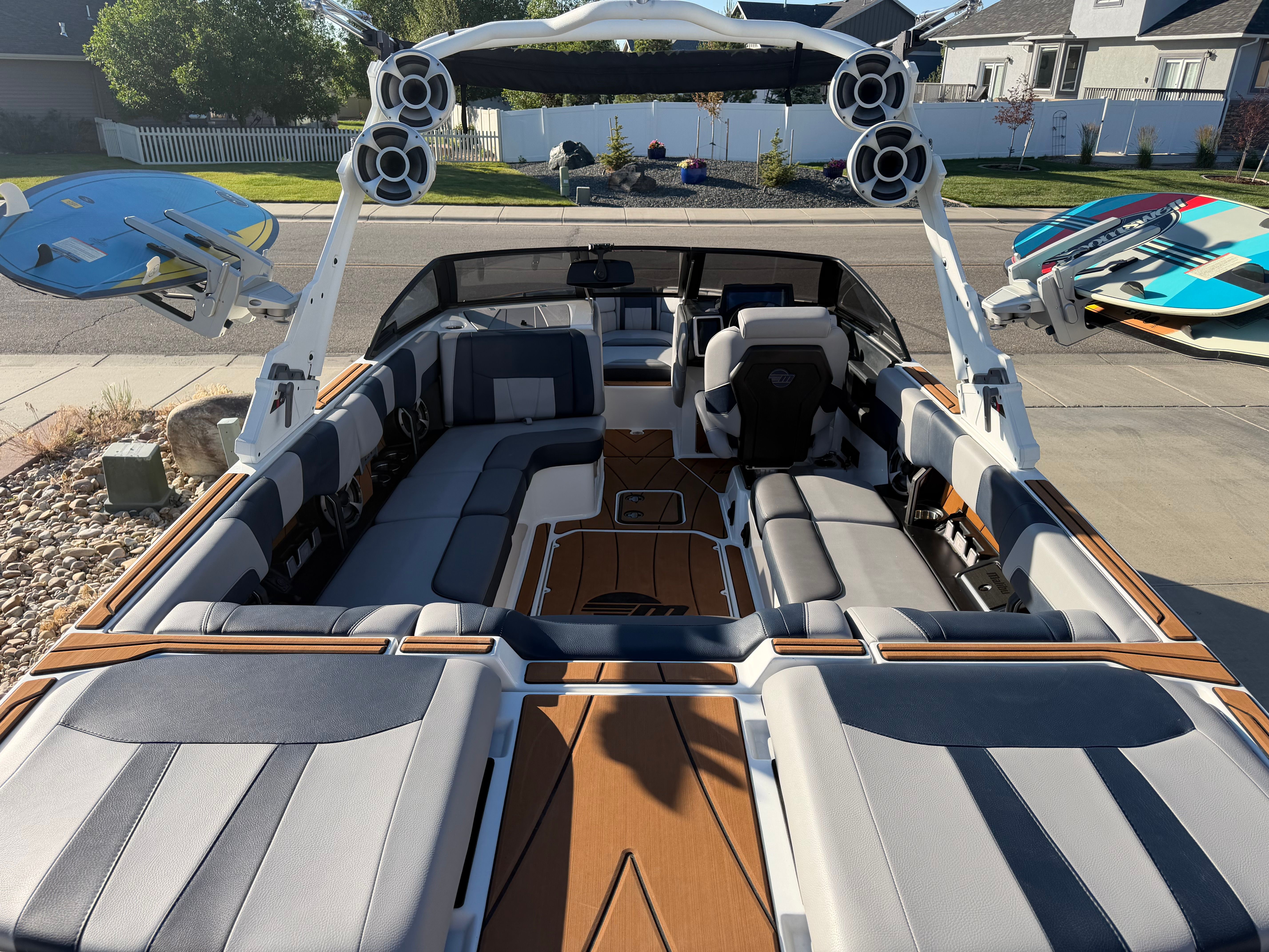 Interior view of a 2021 Malibu Wakesetter 23 LSV with gray and black seating.
