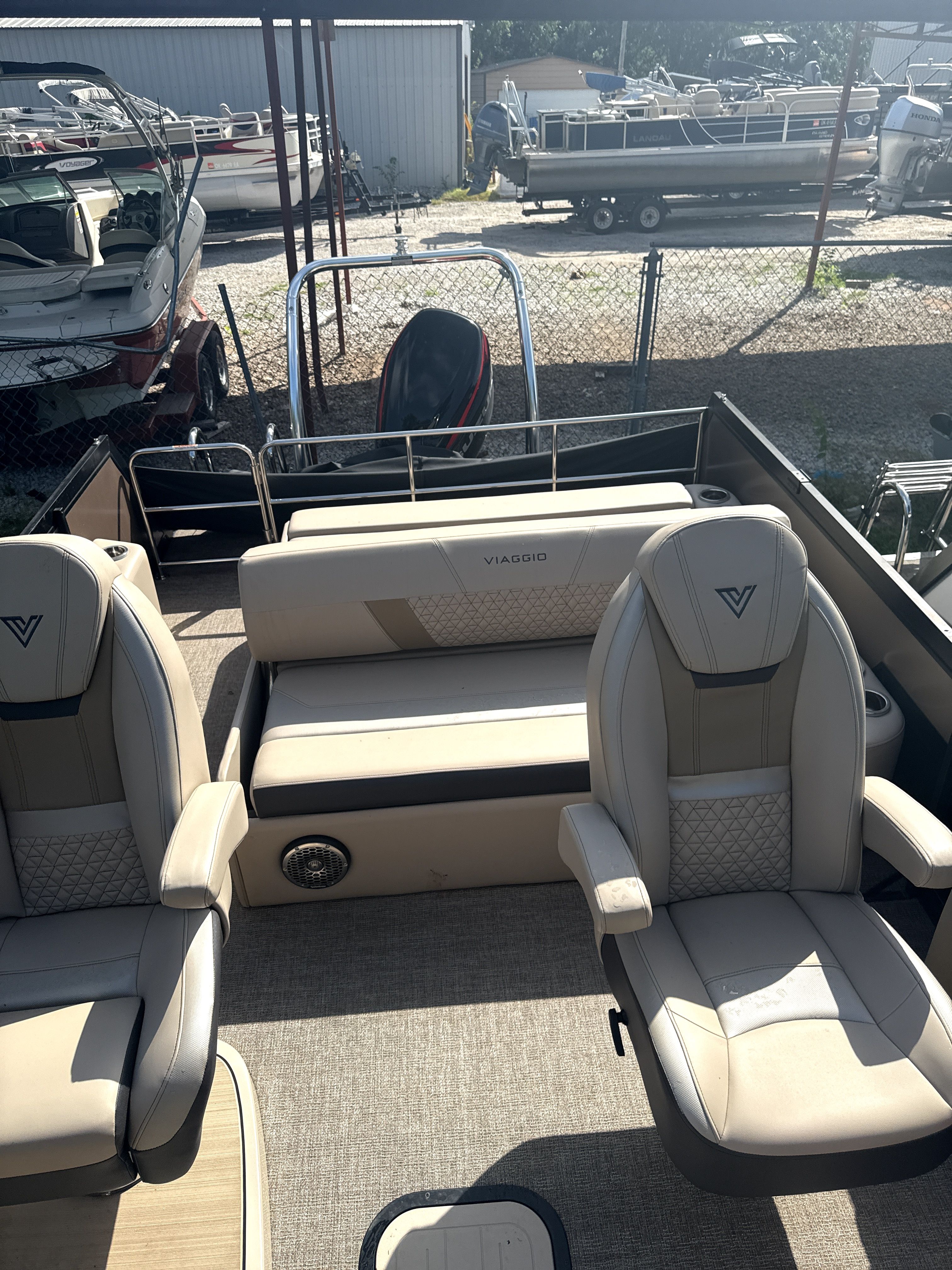 Interior of a 2023 Viaggio Diamante D23S boat with luxurious seating.