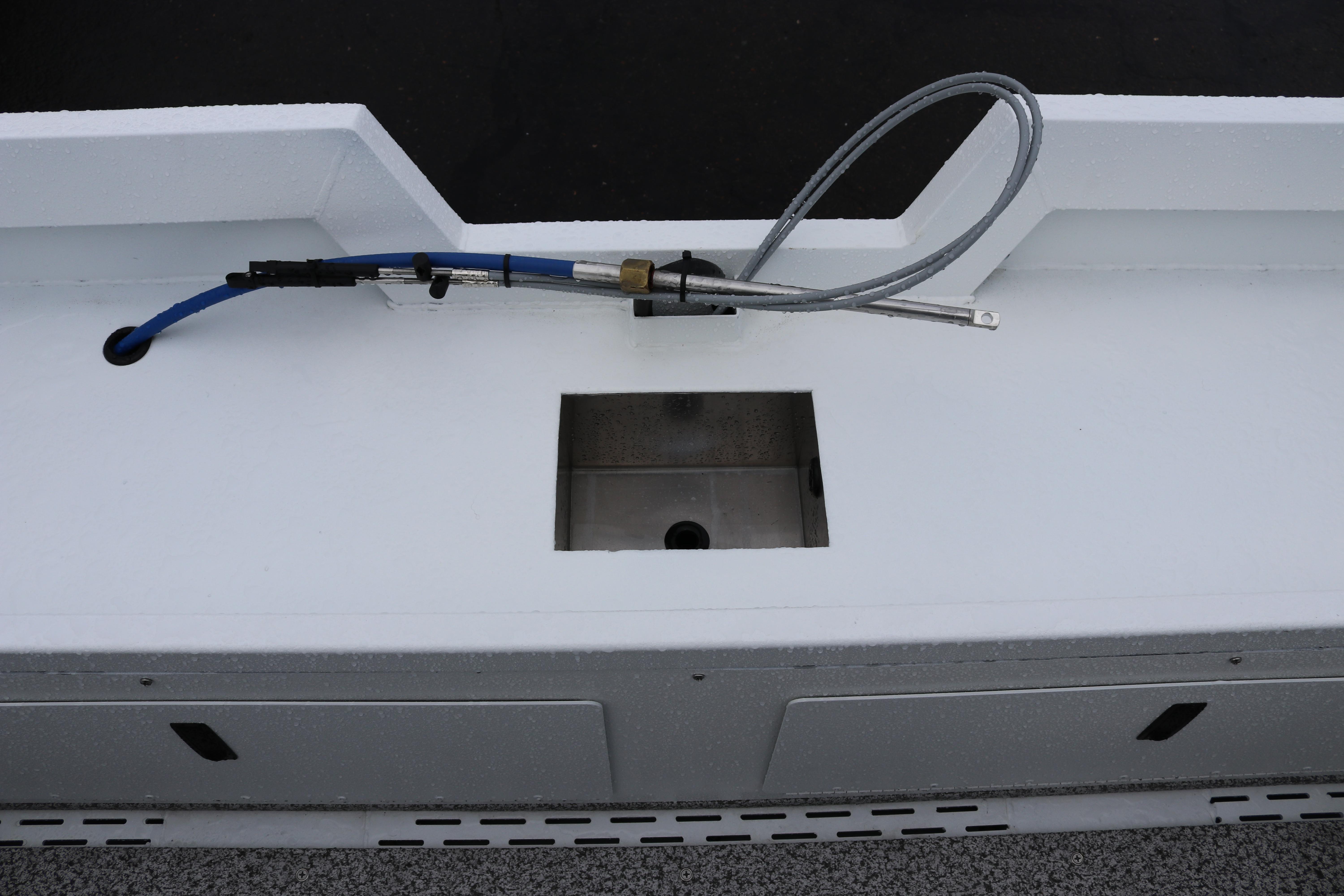 2026 Alumaweld Stryker 202 boat deck with cable and compartment detail.