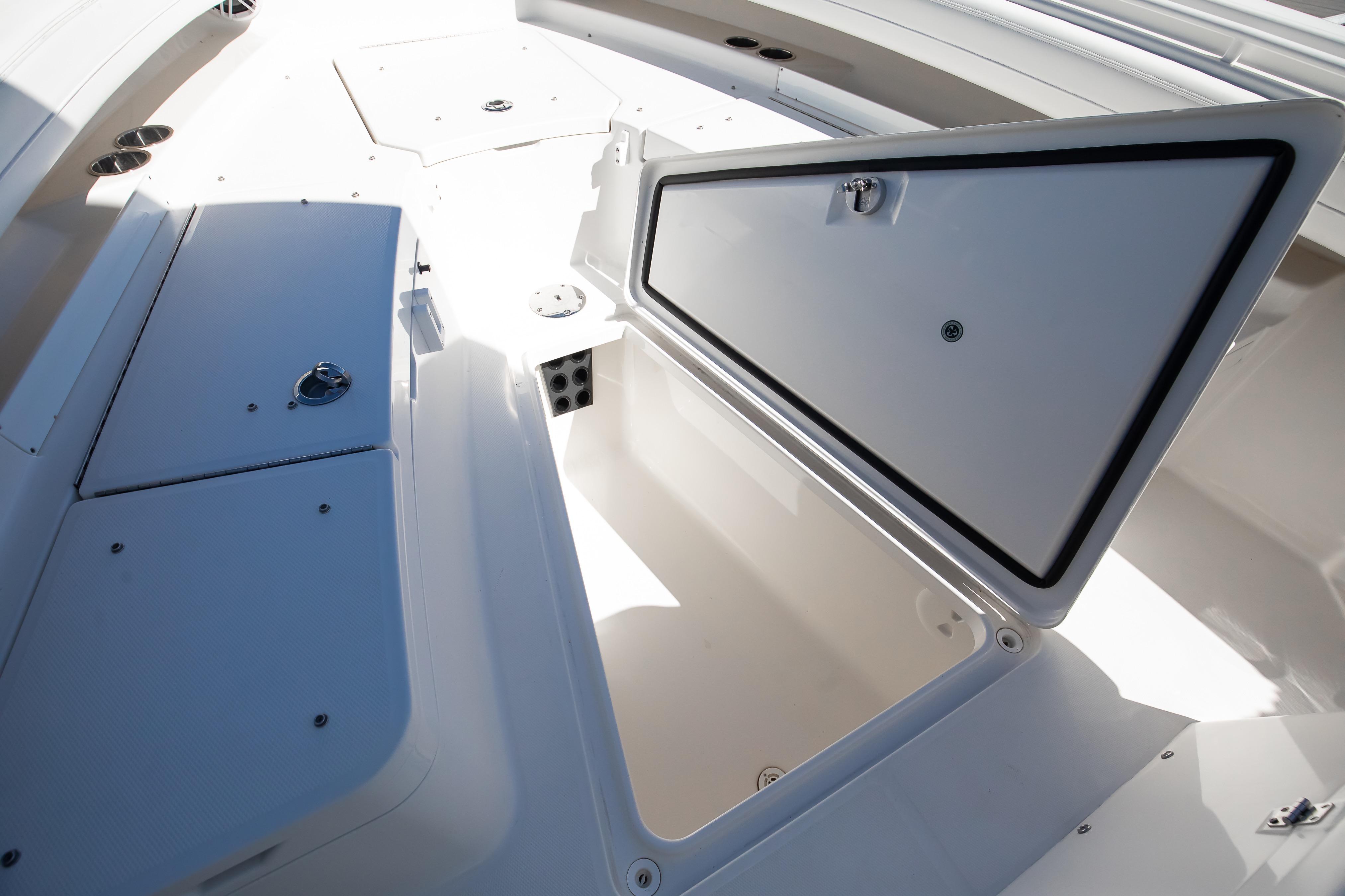 2022 Regulator 28 Forward Seating boat with open storage compartments.