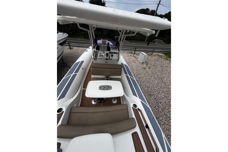 2022 Brig Eagle 8 boat interior with seating and table, showcasing modern design.