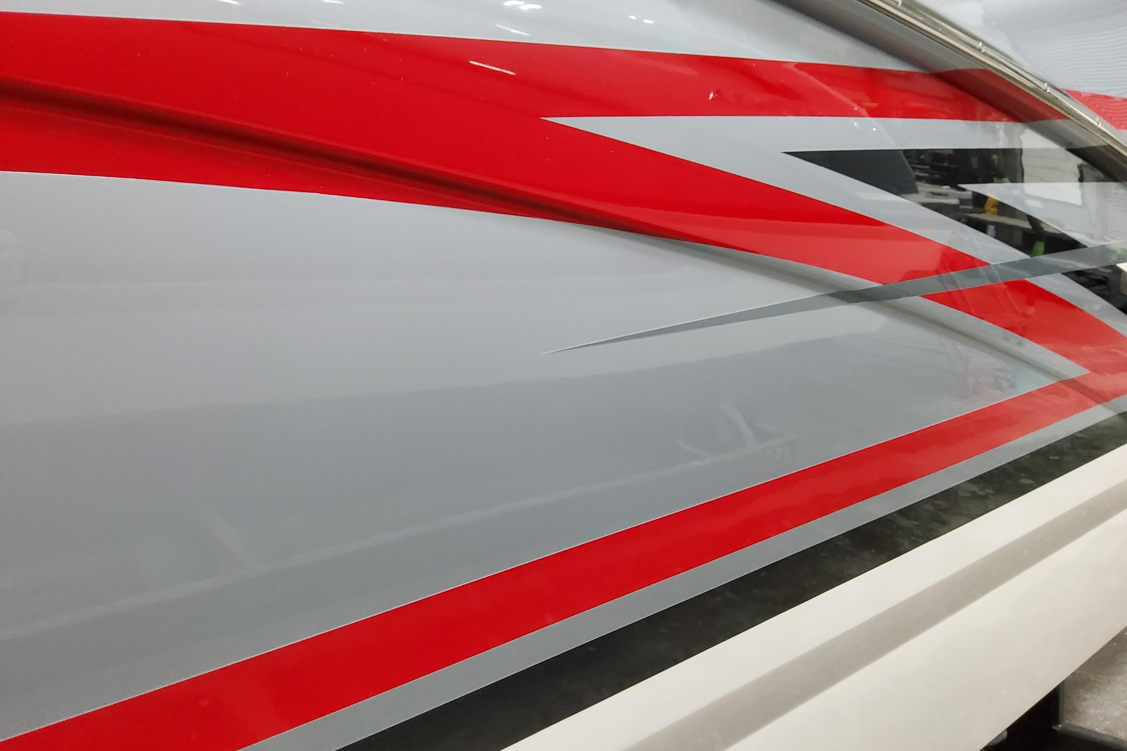 2027 Formula 350 Crossover Bowrider I/O with sleek red and gray exterior design.